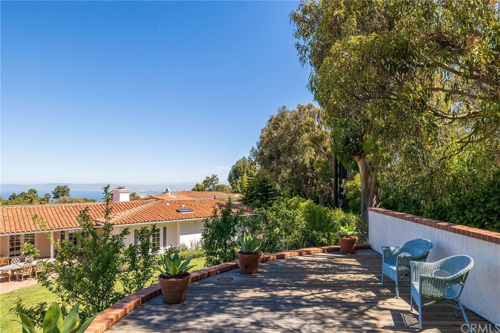 1300 Granvia Altamira Palos Verdes Estates, CA 90274 - Photo 52 of 60 a view of a patio with furniture and a garden