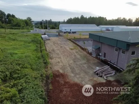 a view of a street with an outdoor space