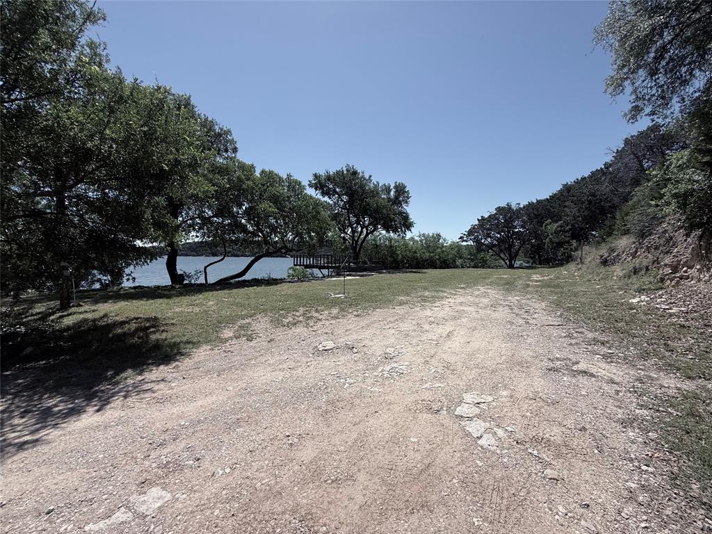 3801 Harbor View Strawn, TX 76429 - Photo 6 of 15 a view of backyard with green space