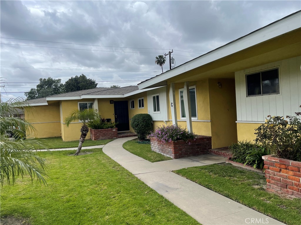 a house view with a garden space