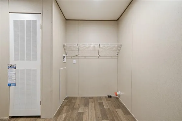 a view of small space with racks on the wall