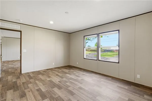 an empty room with windows