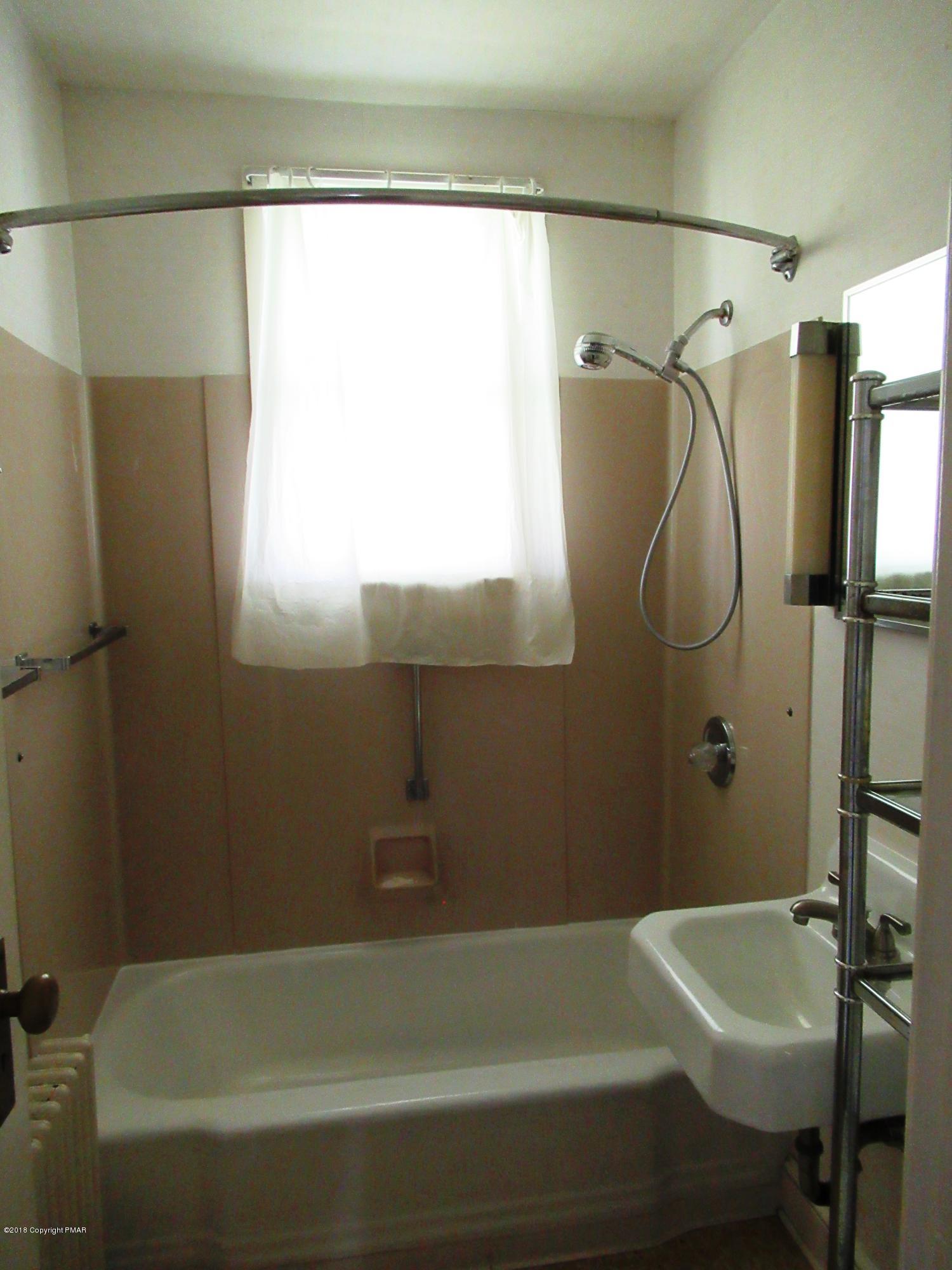 443 Bossardsville Road Stroudsburg, PA 18360 - Photo 17 of 43 a bathroom with a tub and a shower