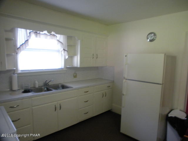 443 Bossardsville Road Stroudsburg, PA 18360 - Photo 28 of 43 a bathroom with a double vanity sink and mirror