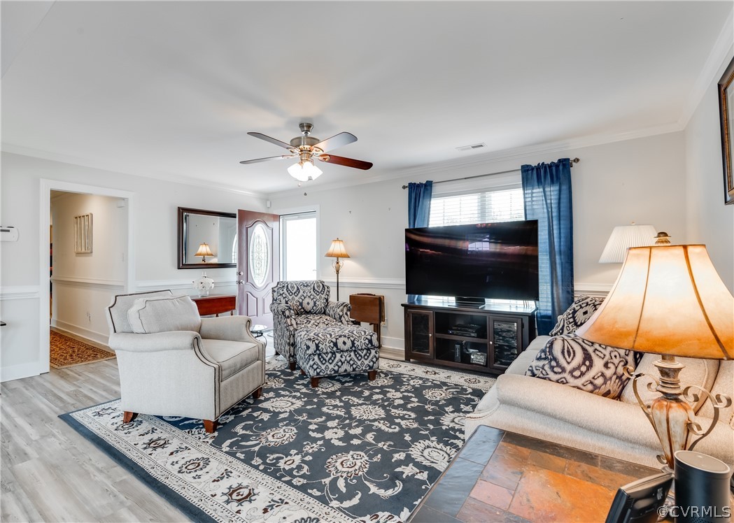 540 Clayville Road Powhatan, VA 23139 - Photo 5 of 42 Family room has chair and crown moldings.