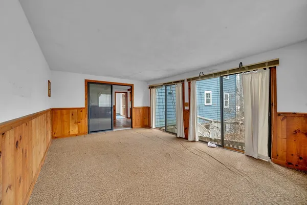a big room with windows and closet