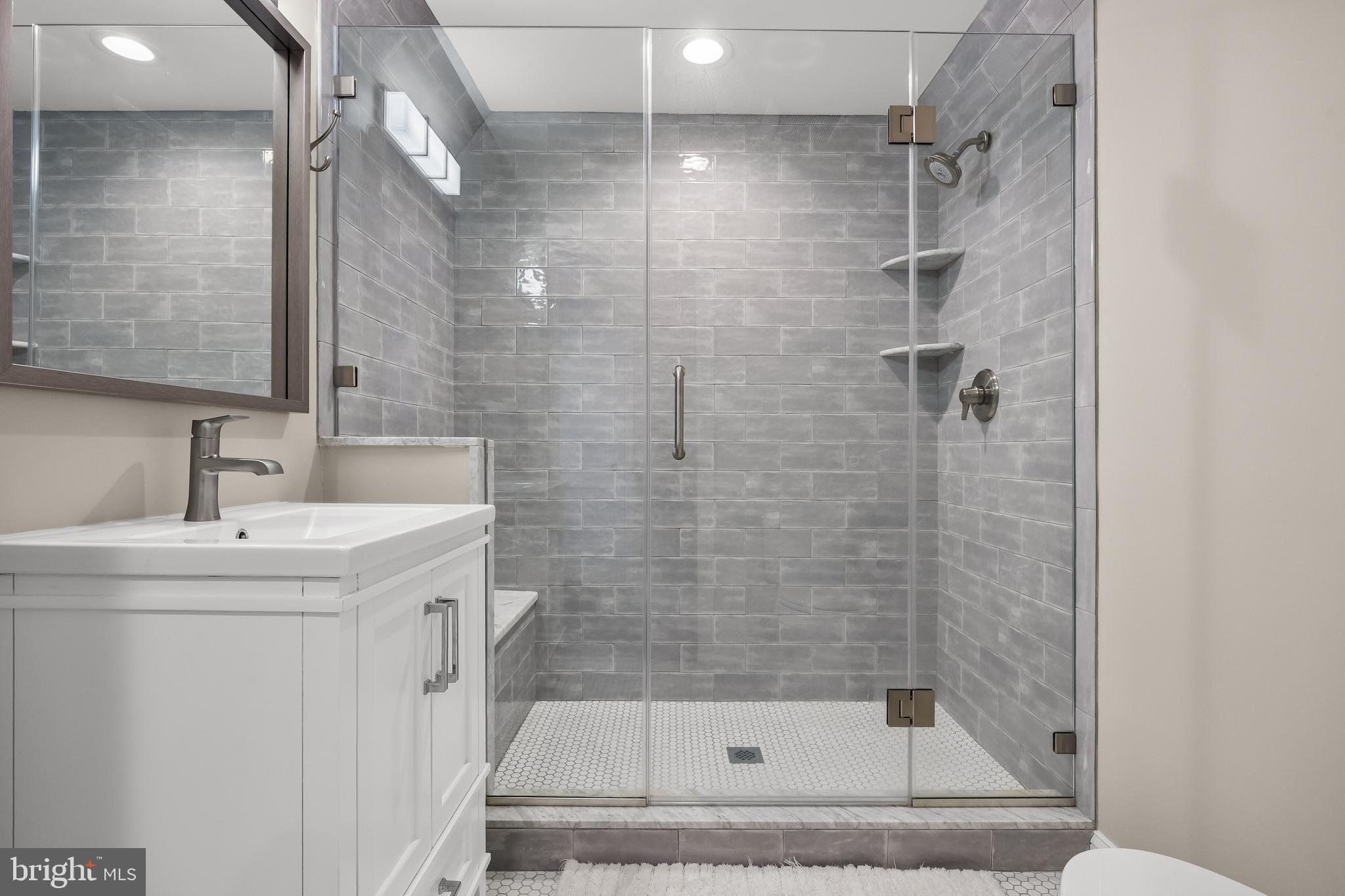 863 Golf View Road Moorestown, NJ 08057 - Photo 15 of 20 a bathroom with a shower and a sink