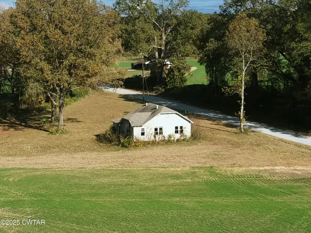 a view of a lake from a yard