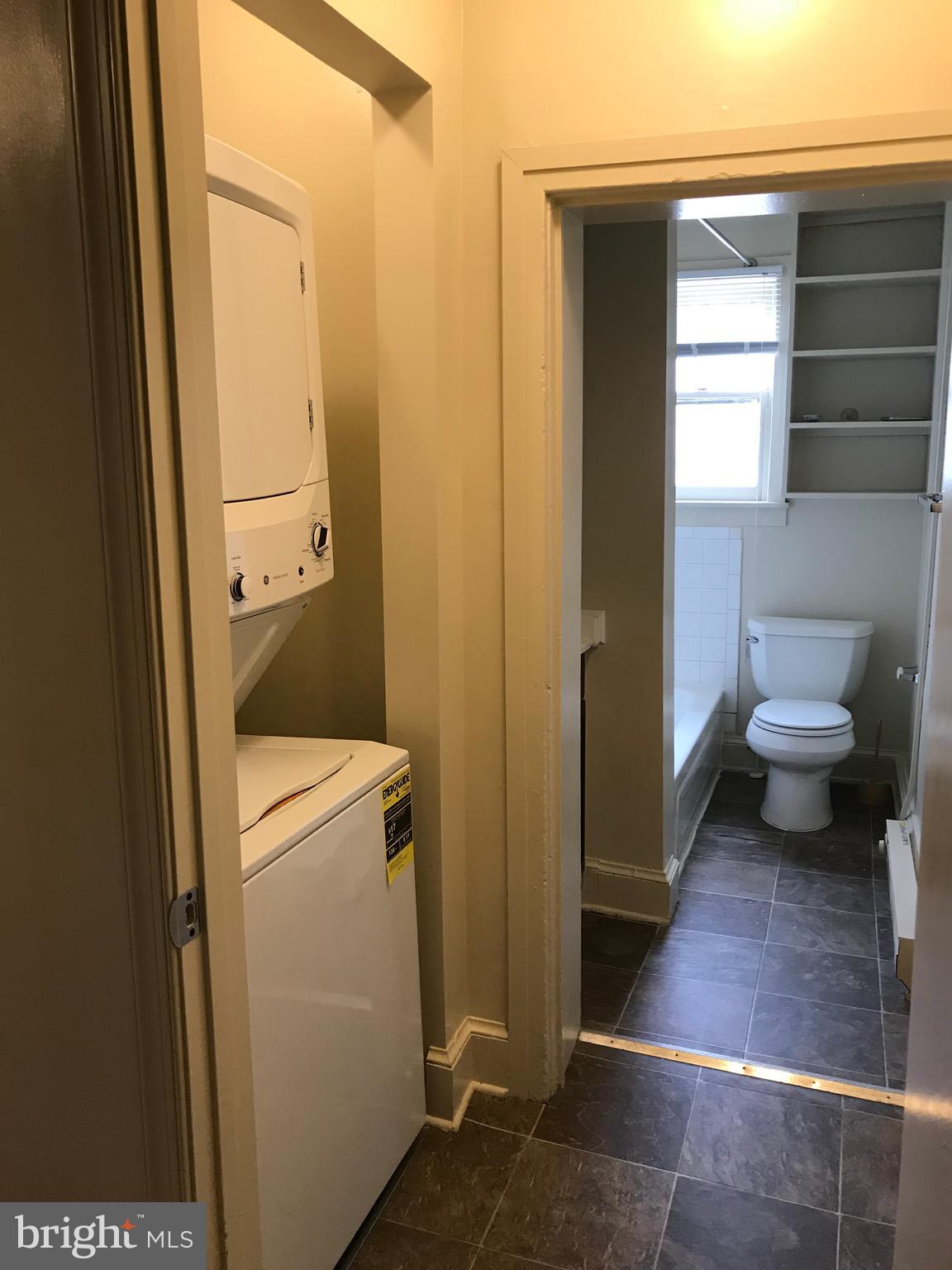 244 East Patrick Street, Unit 2 Frederick, MD 21701 - Photo 7 of 18 a bathroom with a toilet and a shower