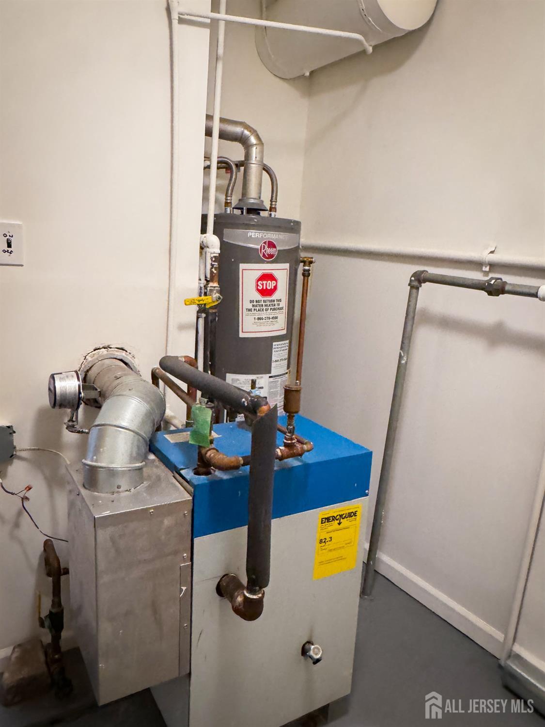 121 1st Street Middlesex, NJ 08846 - Photo 23 of 34 a utility room with dryer and washer