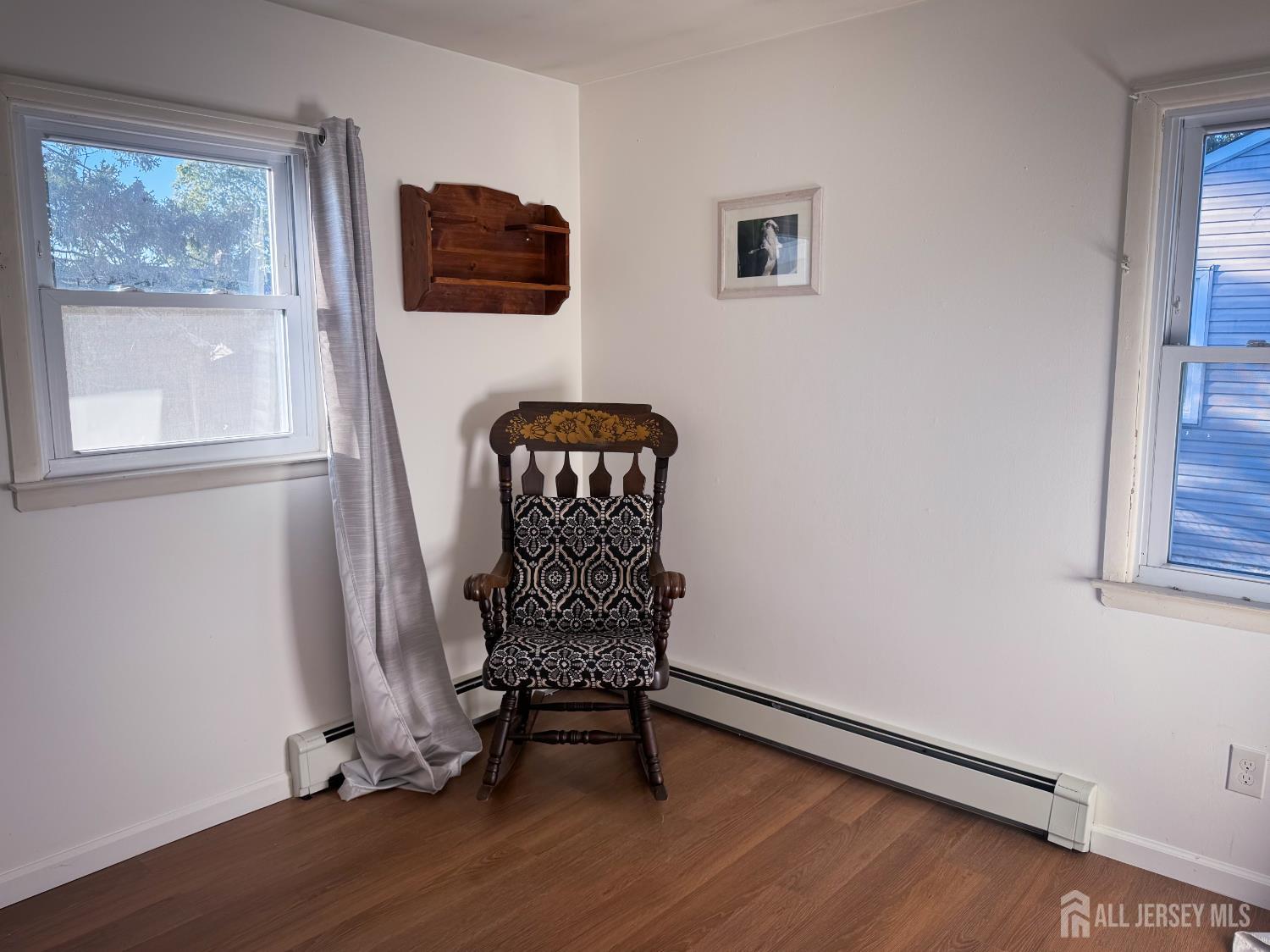 121 1st Street Middlesex, NJ 08846 - Photo 24 of 34 a view of a workspace with furniture and a window