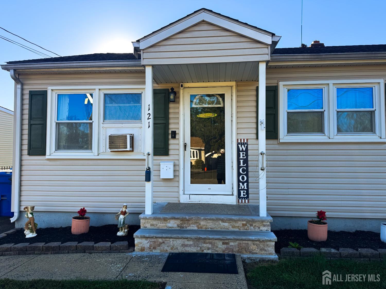 121 1st Street Middlesex, NJ 08846 - Photo 4 of 34 a view of a house with many windows