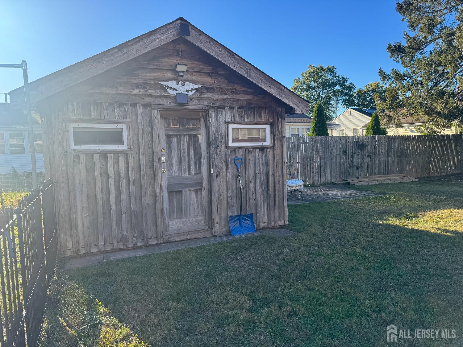 121 1st Street Middlesex, NJ 08846 - Photo 6 of 34 a view of a backyard with a small cabin