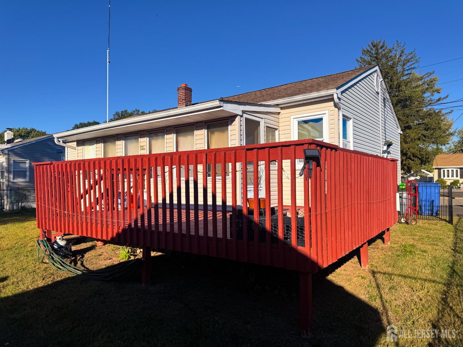 121 1st Street Middlesex, NJ 08846 - Photo 8 of 34 a front view of a house with a garden