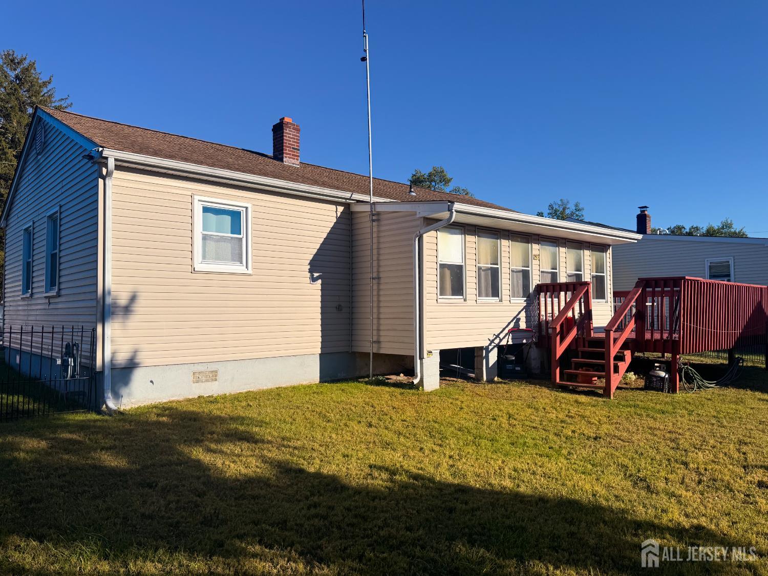 121 1st Street Middlesex, NJ 08846 - Photo 10 of 34 a view of a house with backyard and sitting area