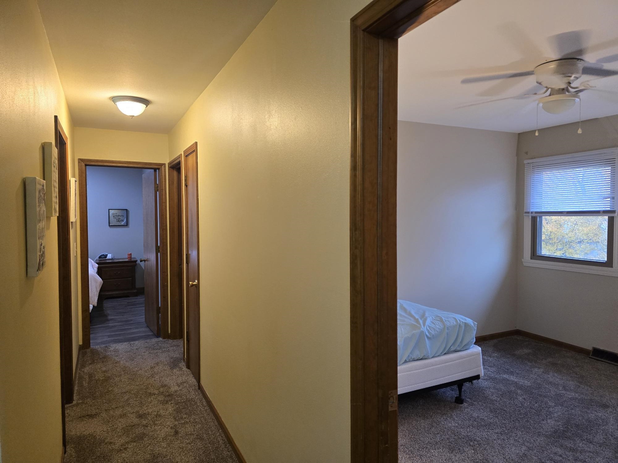 1208 Roxbury Close Rockford, IL 61107 - Photo 16 of 22 a view of a hallway with a room