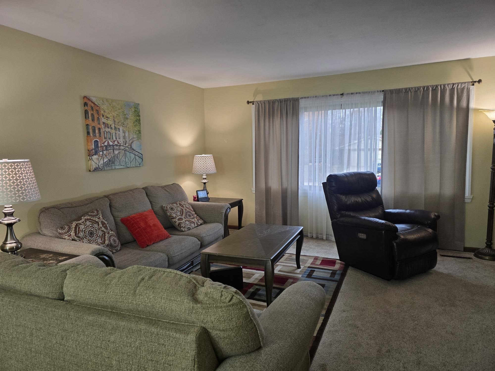 1208 Roxbury Close Rockford, IL 61107 - Photo 6 of 22 a living room with furniture and a window