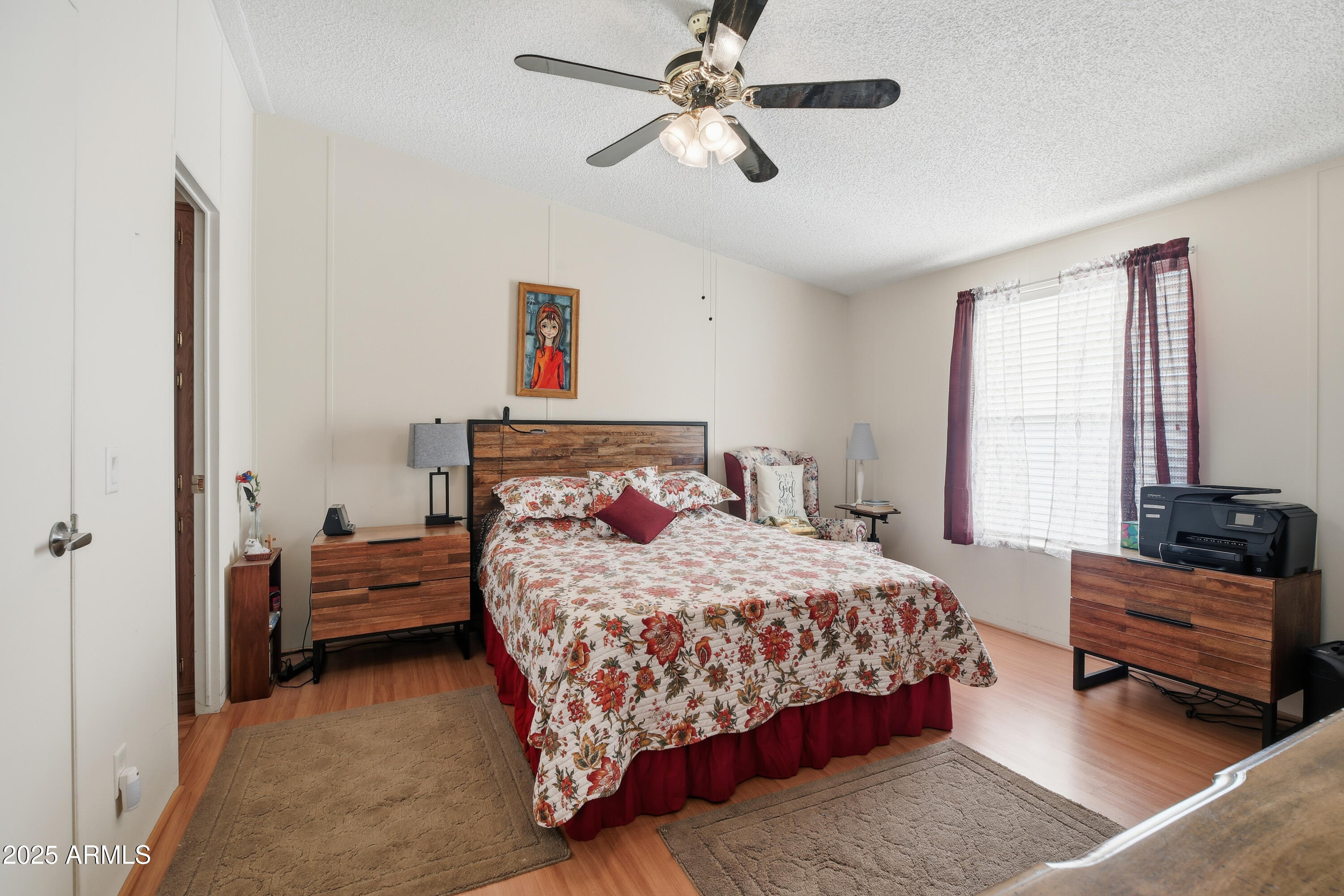 2050 West State Rte 89A, Unit 92 Sedona, AZ 86336 - Photo 18 of 34 a bedroom with a bed couch and a window