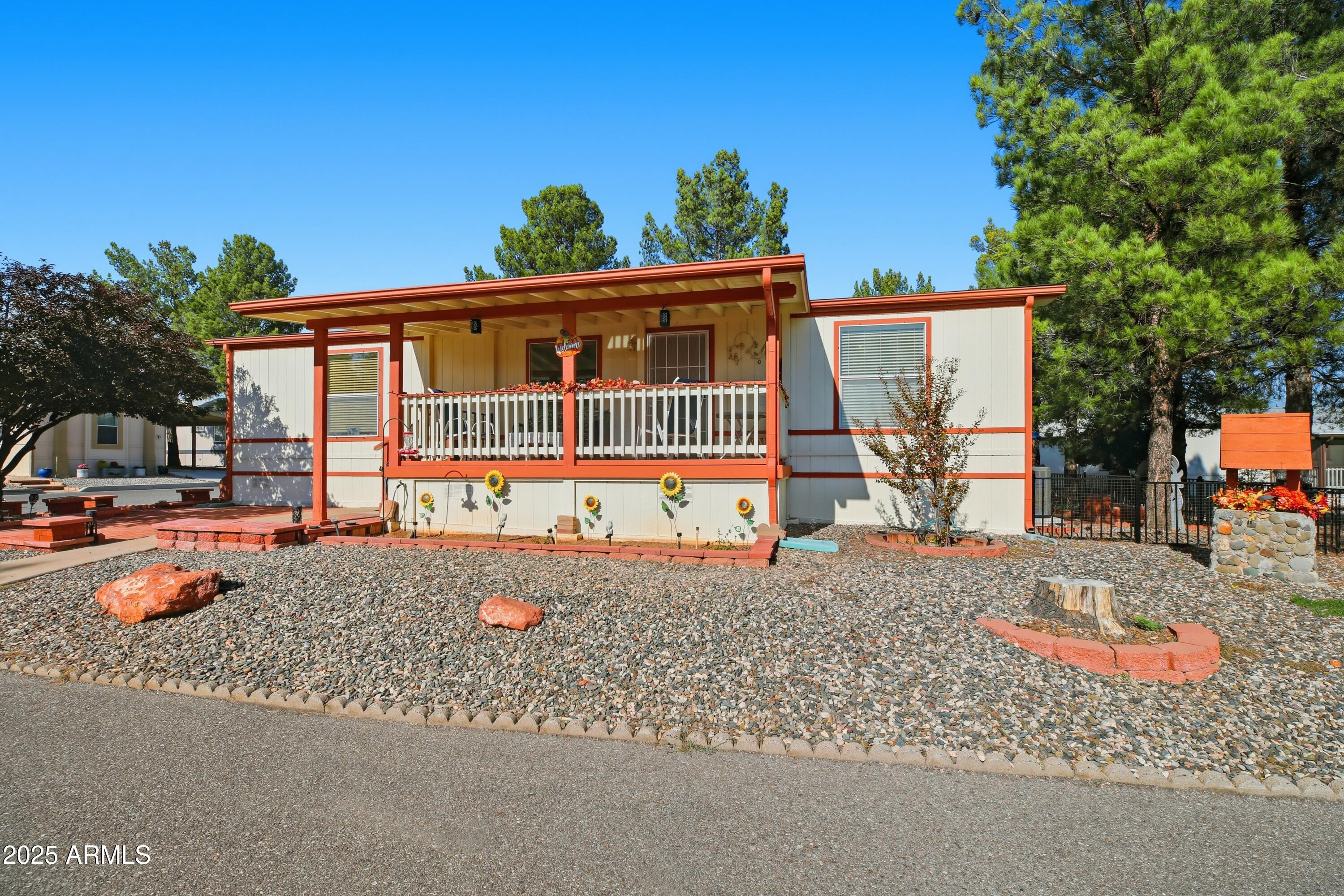 2050 West State Rte 89A, Unit 92 Sedona, AZ 86336 - Photo 2 of 34 front view of a house with a patio