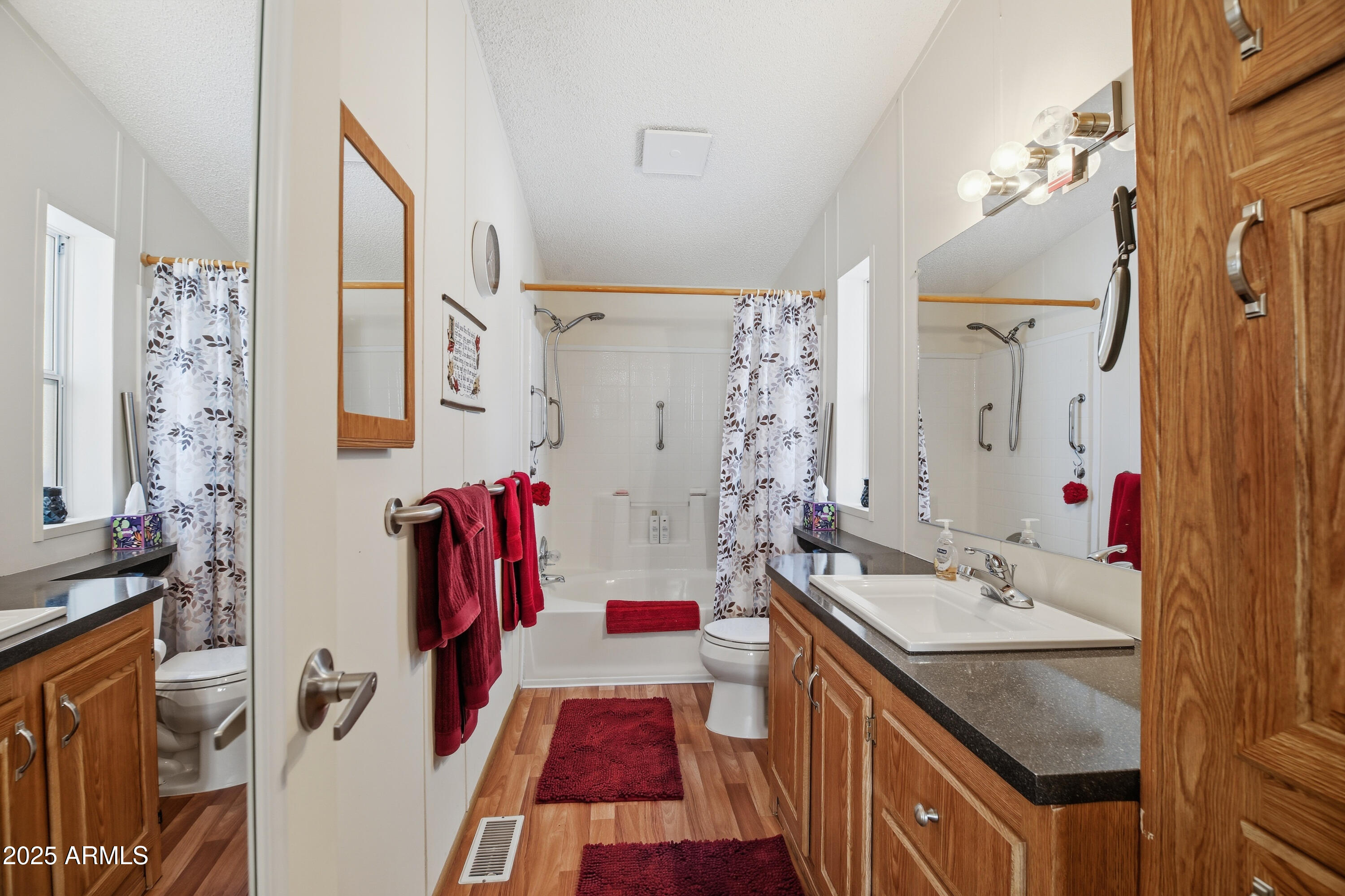 2050 West State Rte 89A, Unit 92 Sedona, AZ 86336 - Photo 21 of 34 a bathroom with a sink a tub and shower