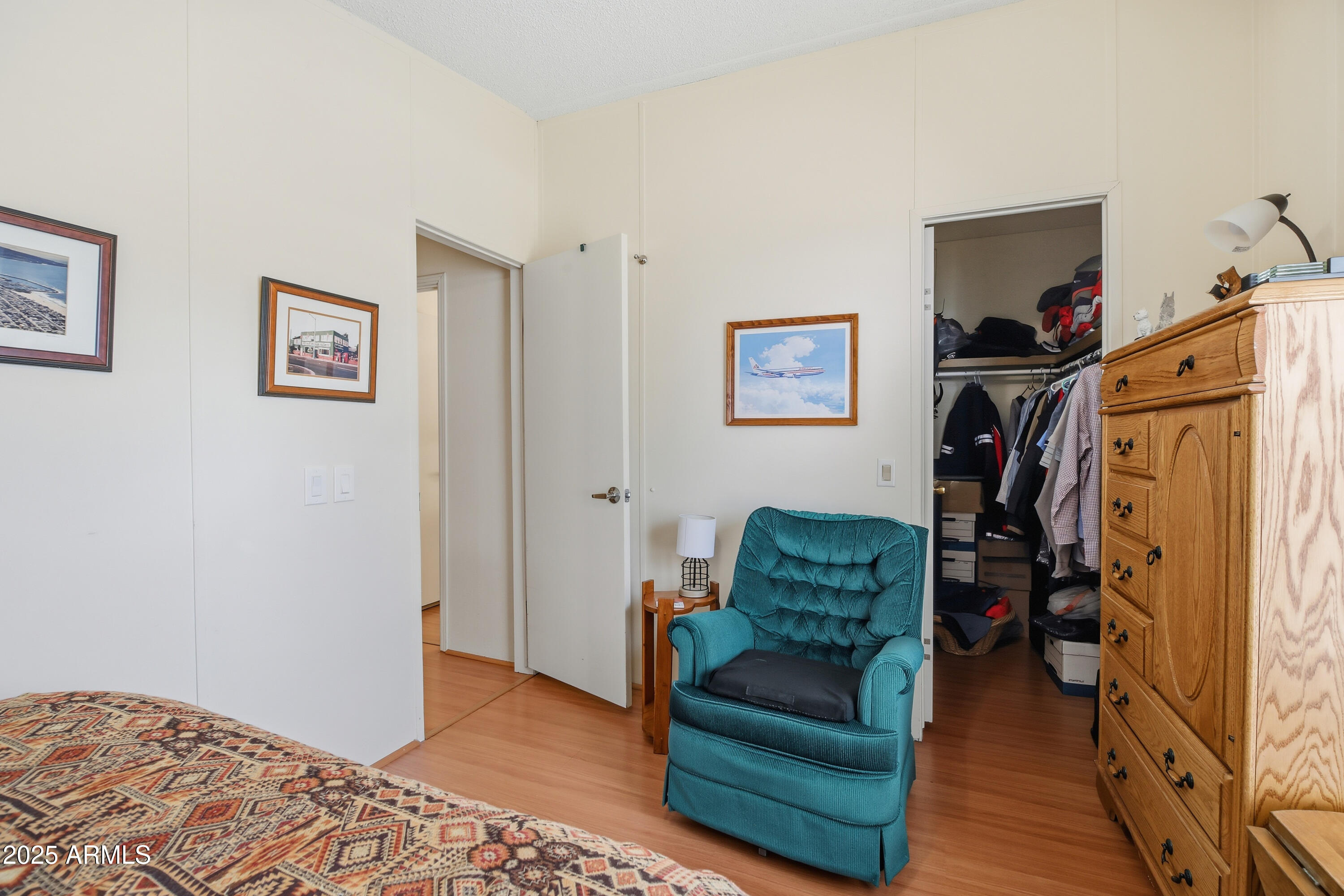 2050 West State Rte 89A, Unit 92 Sedona, AZ 86336 - Photo 24 of 34 a bedroom with furniture and a rug