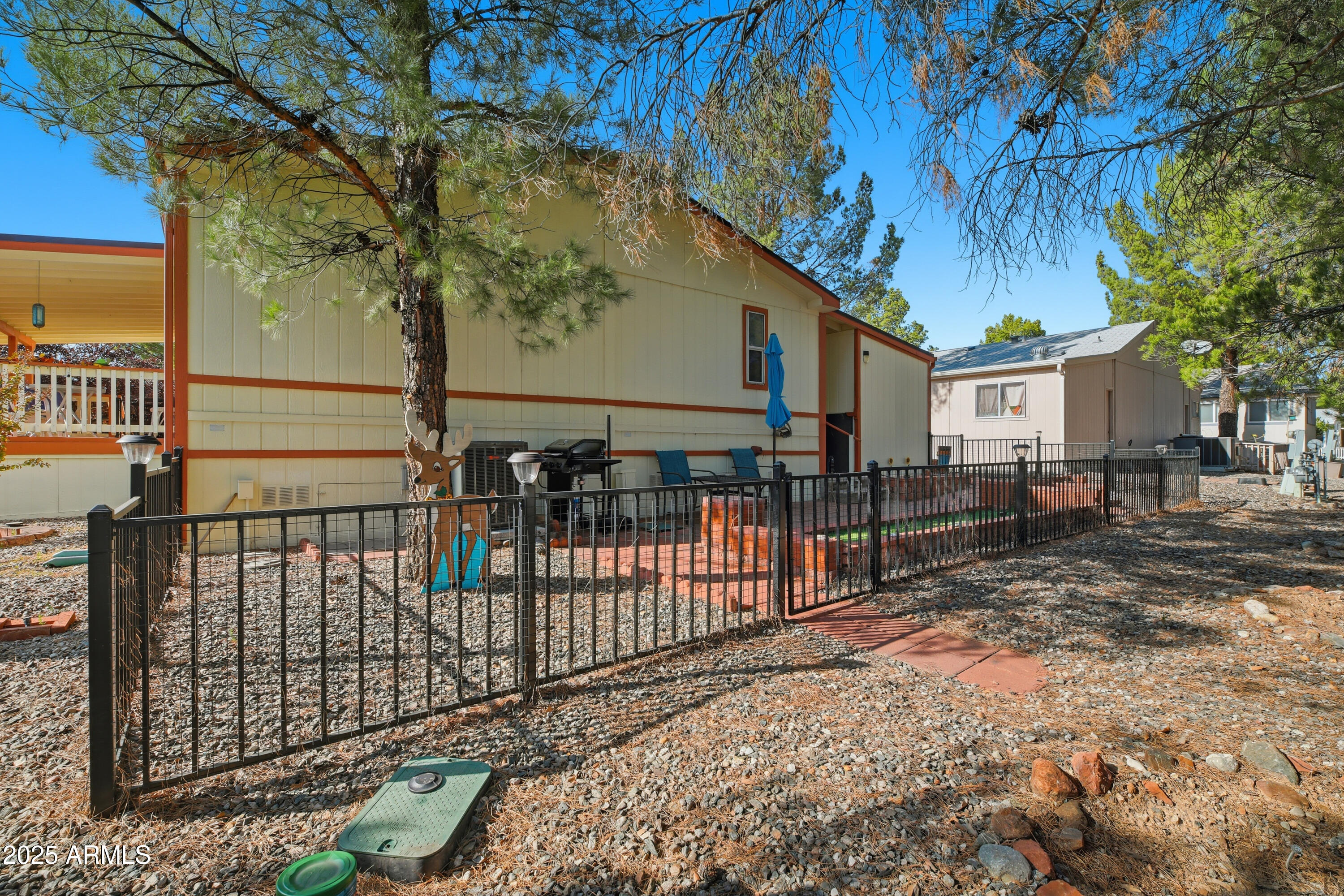 2050 West State Rte 89A, Unit 92 Sedona, AZ 86336 - Photo 33 of 34 a view of a wrought iron fences in front of house