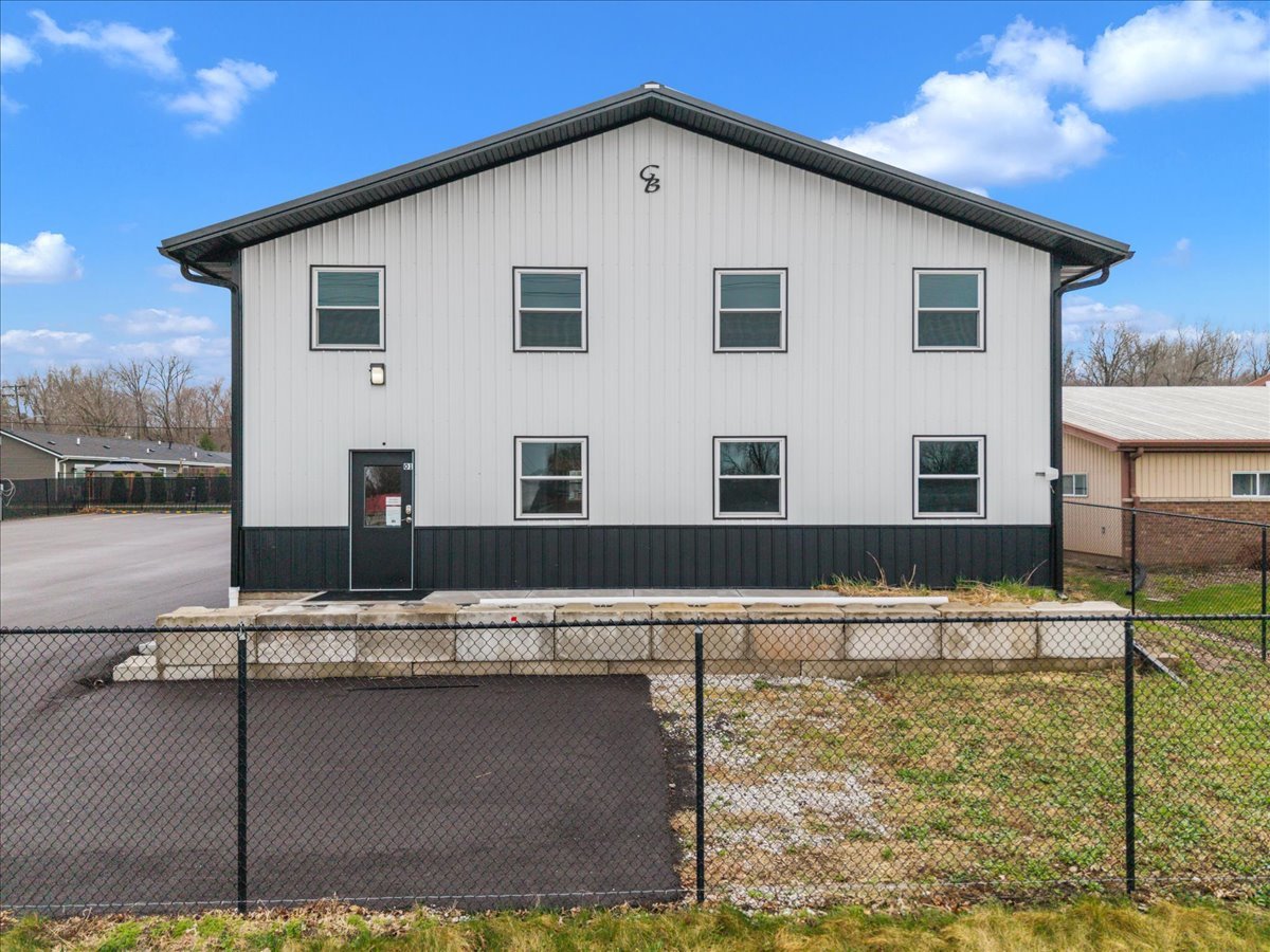 602 2nd Street West Andalusia, IL 61232 - Photo 2 of 71 a front view of a house with swimming pool