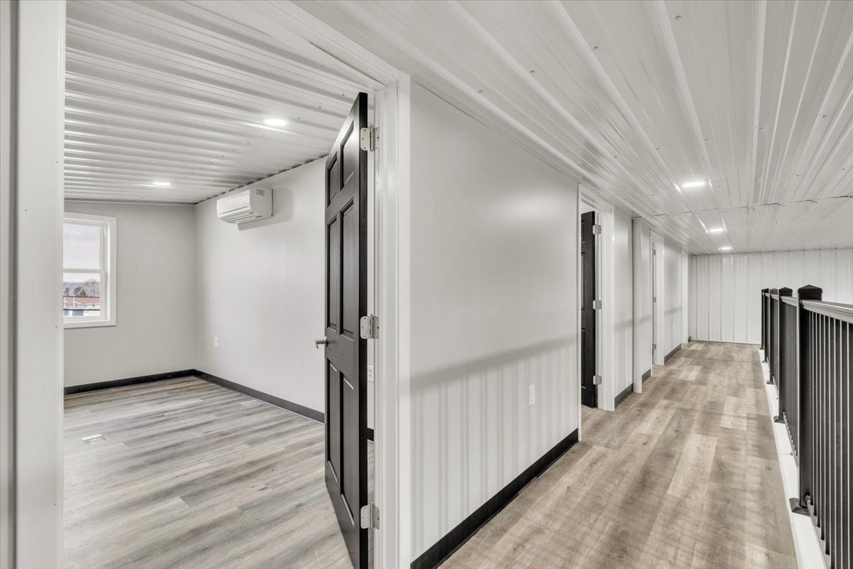 602 2nd Street West Andalusia, IL 61232 - Photo 22 of 71 a view of a hallway with wooden floor