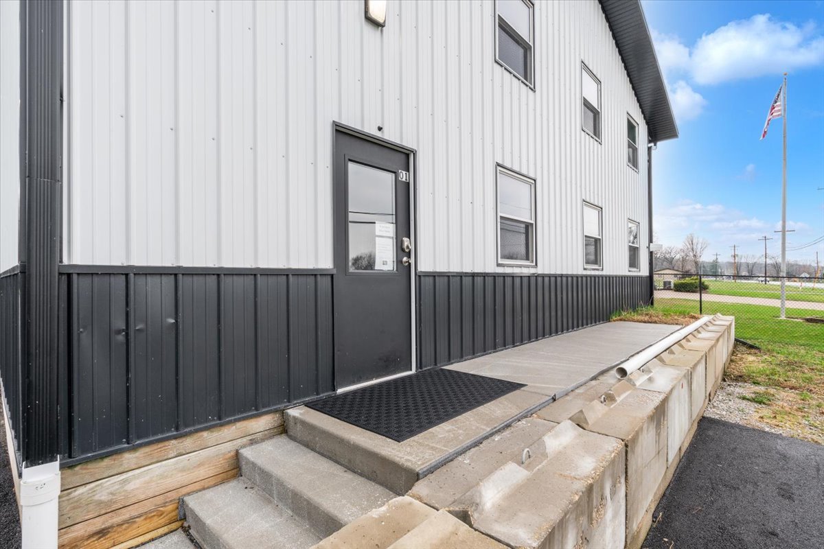 602 2nd Street West Andalusia, IL 61232 - Photo 3 of 71 a view of a patio with a table and chairs