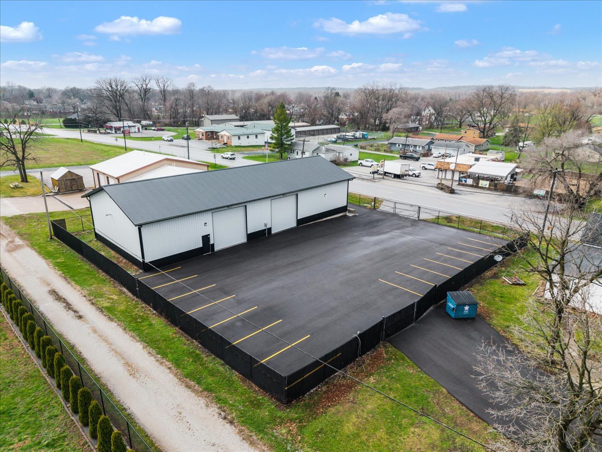 602 2nd Street West Andalusia, IL 61232 - Photo 31 of 71 a view of a swimming pool with a lounge chair