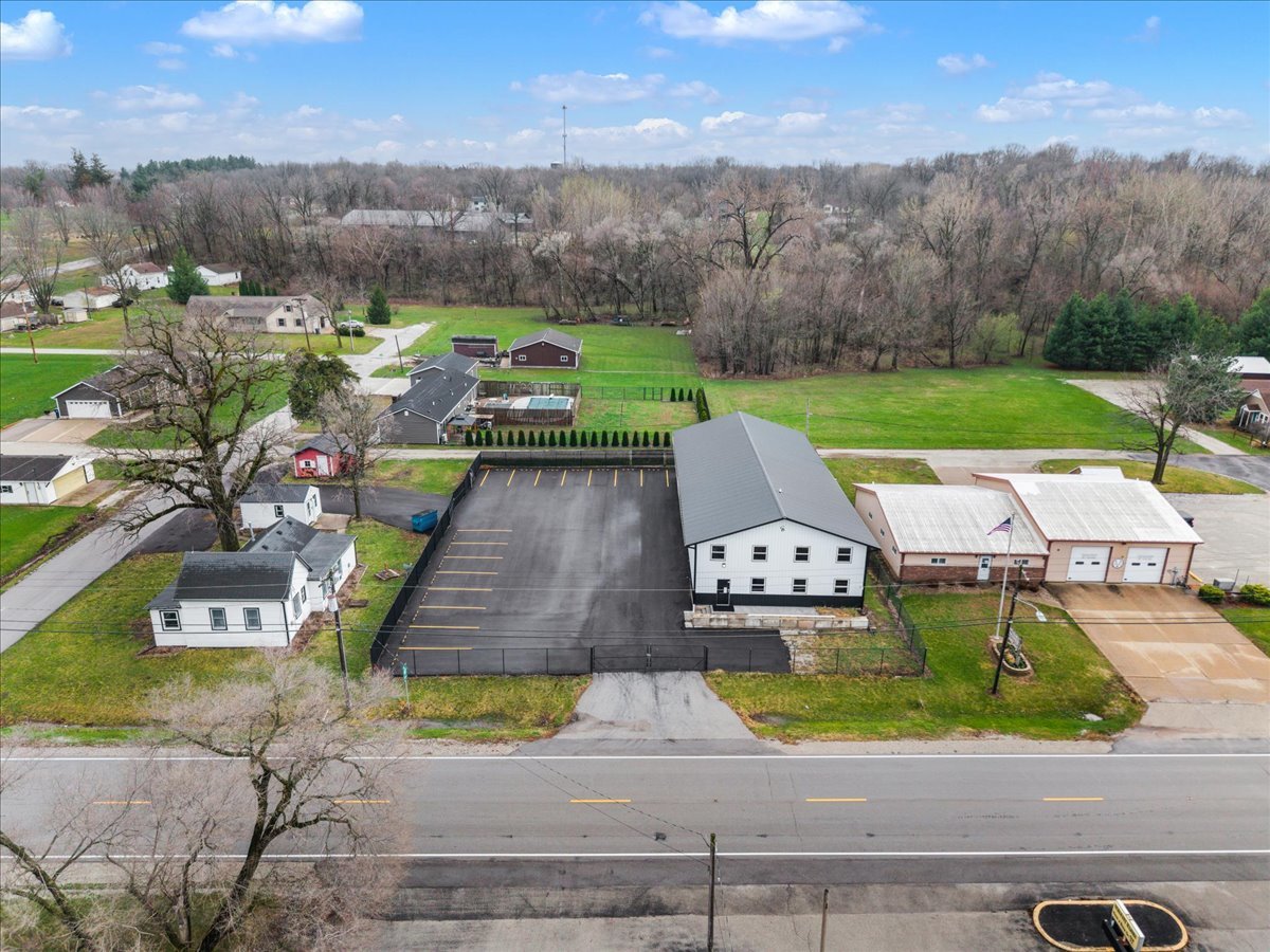 602 2nd Street West Andalusia, IL 61232 - Photo 33 of 71 an aerial view of a house with garden space and street view