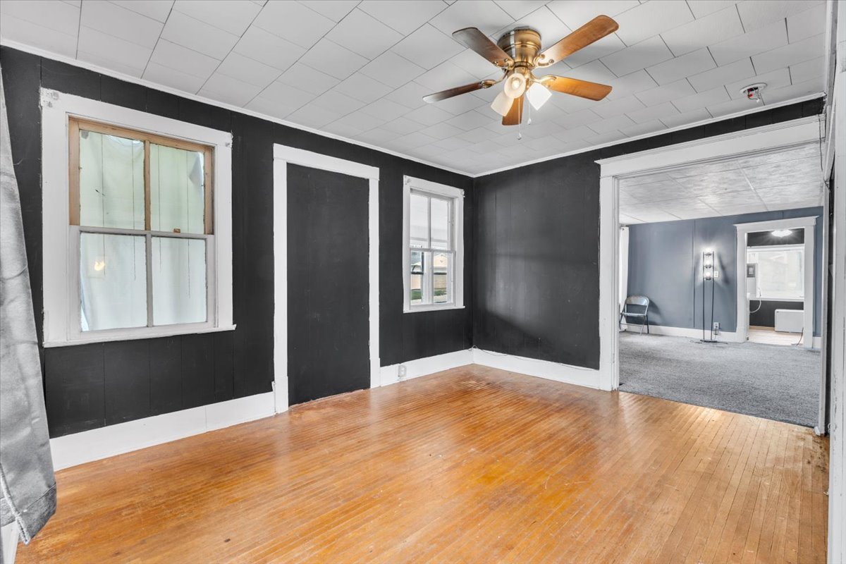 602 2nd Street West Andalusia, IL 61232 - Photo 57 of 71 a view of an empty room with window and a kitchen