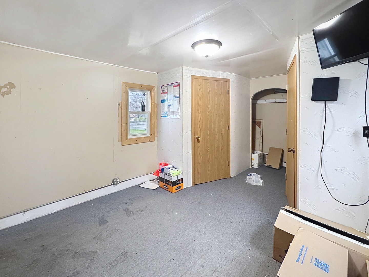 602 2nd Street West Andalusia, IL 61232 - Photo 66 of 71 a view of a livingroom with furniture and a flat screen tv
