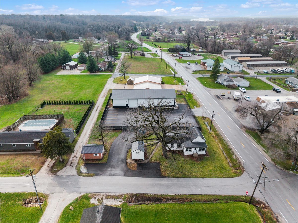 602 2nd Street West Andalusia, IL 61232 - Photo 70 of 71 an aerial view of a house with a garden and lake view