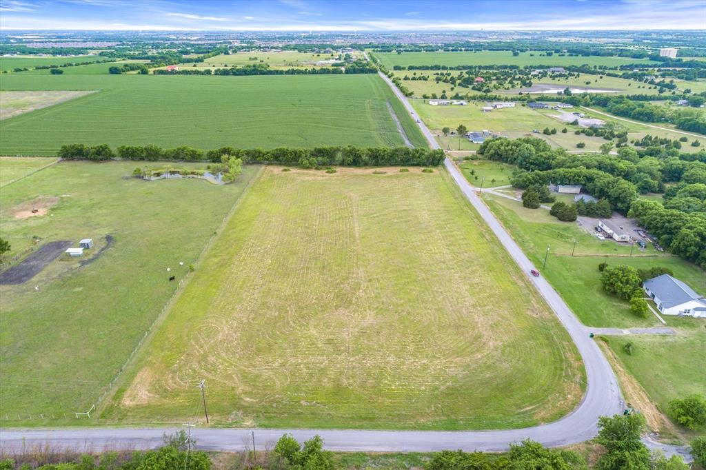 1017 County Road 979 Fate, TX 75189 - Photo 2 of 5 a view of a swimming pool with a lake view