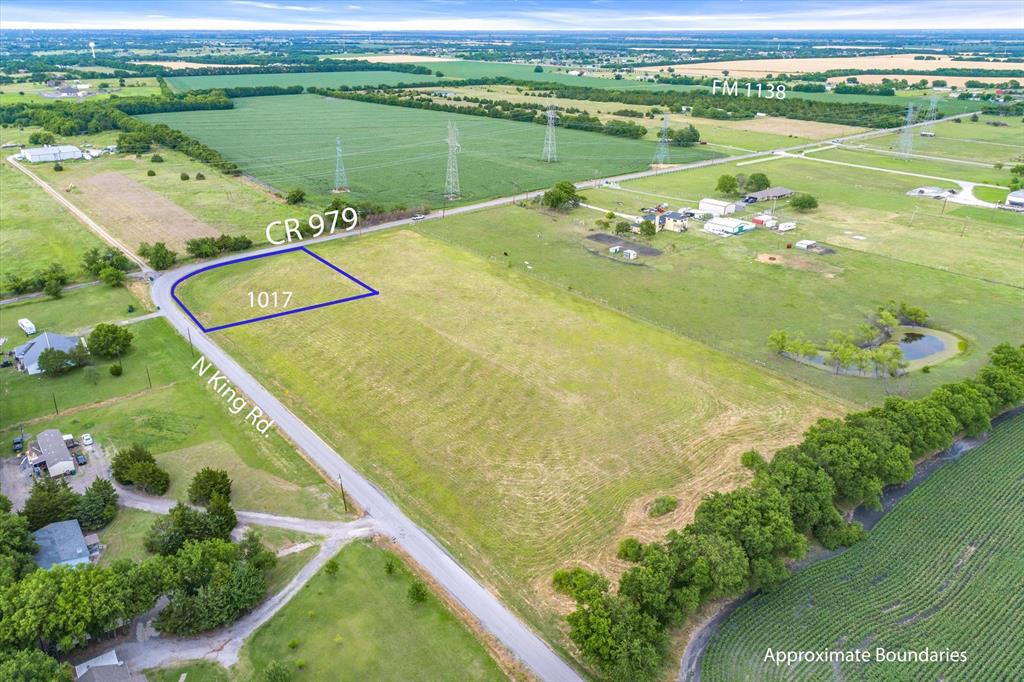 1017 County Road 979 Fate, TX 75189 - Photo 3 of 5 a view of a lake with a ocean view