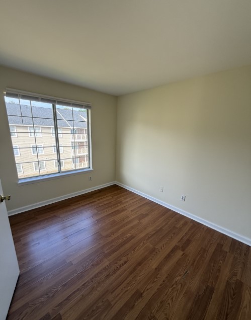 220 Elm Street, Unit 533 Clemson, SC 29631 - Photo 7 of 10 Rich hardwood-style flooring extends through this naturally lit, versatile room.
