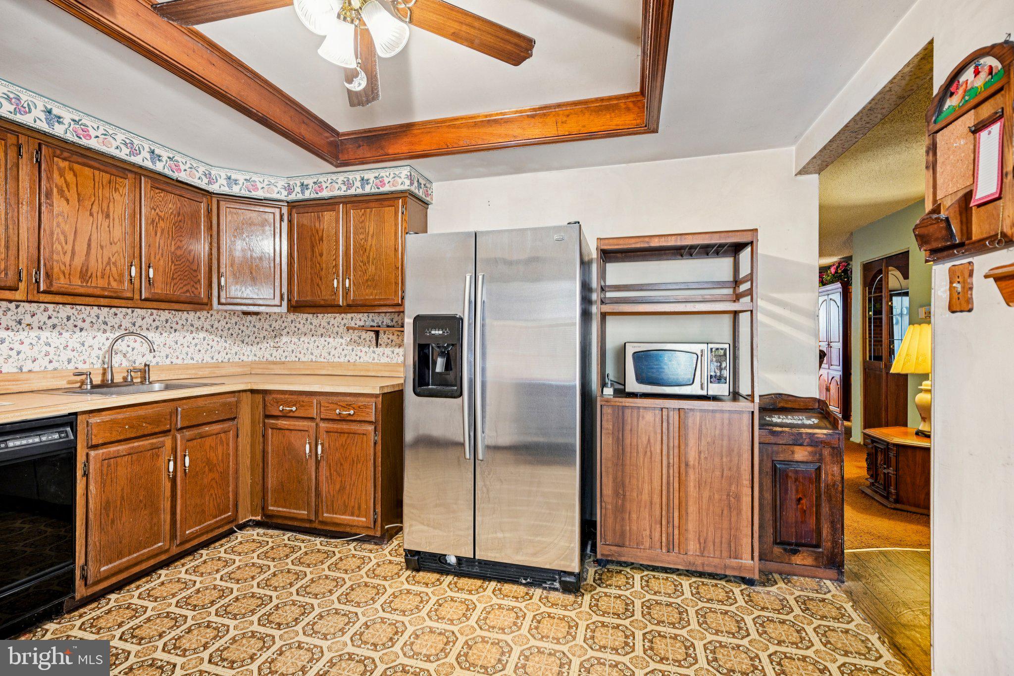 1502 Bromley Estate Pine Hill, NJ 08021 - Photo 14 of 36 a kitchen with stainless steel appliances granite countertop a refrigerator a sink and dishwasher