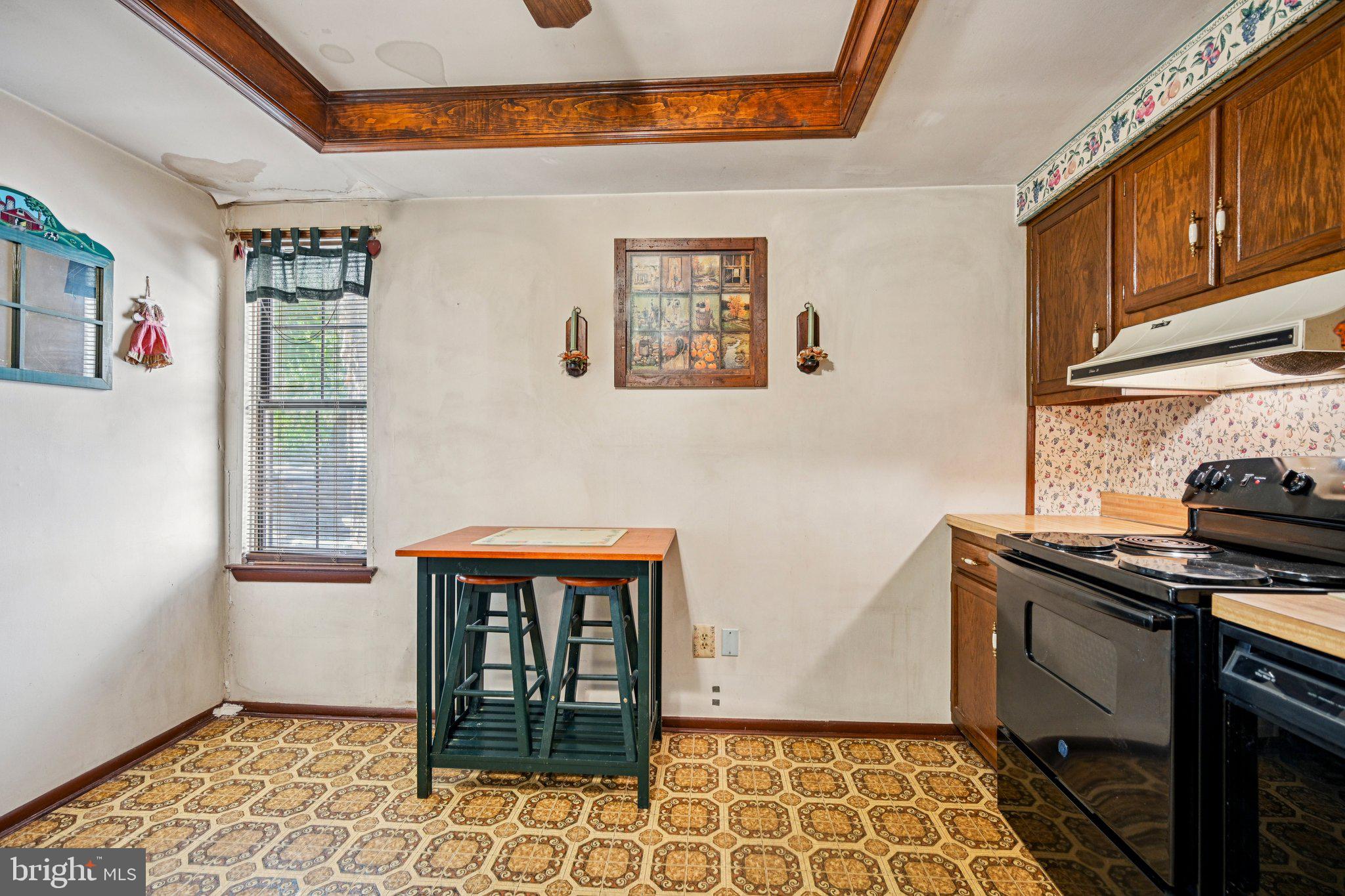 1502 Bromley Estate Pine Hill, NJ 08021 - Photo 16 of 36 a kitchen with stainless steel appliances granite countertop a stove and a window