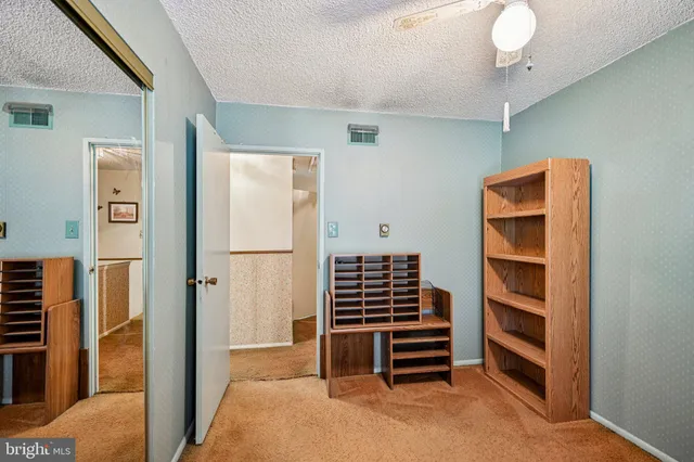 a view of room with walk in closet