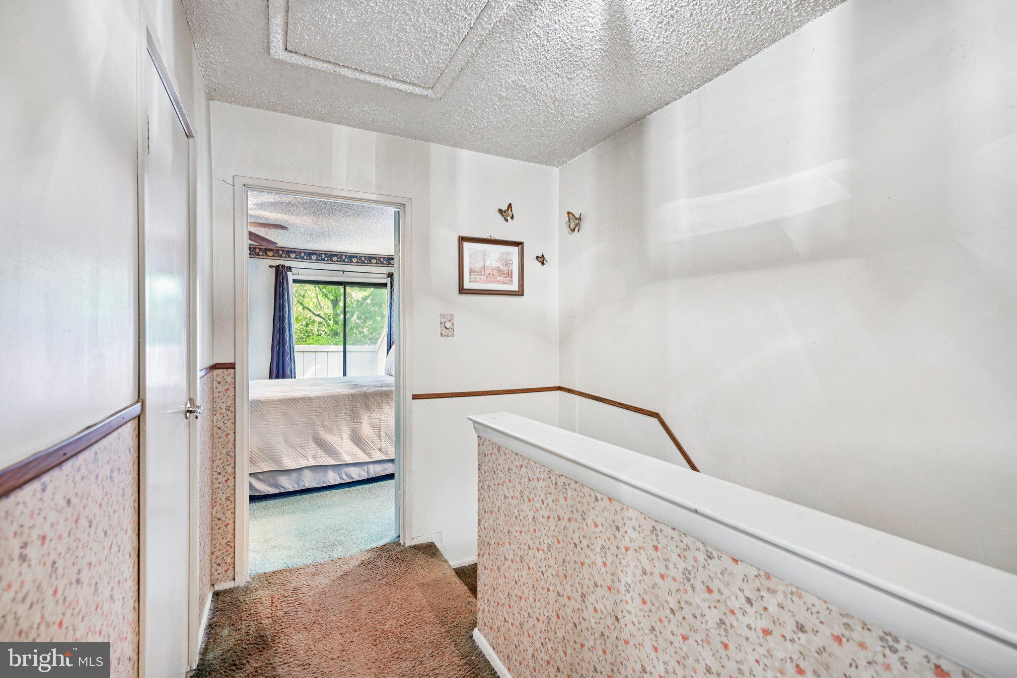 1502 Bromley Estate Pine Hill, NJ 08021 - Photo 23 of 36 a living room with a bed furniture and a window