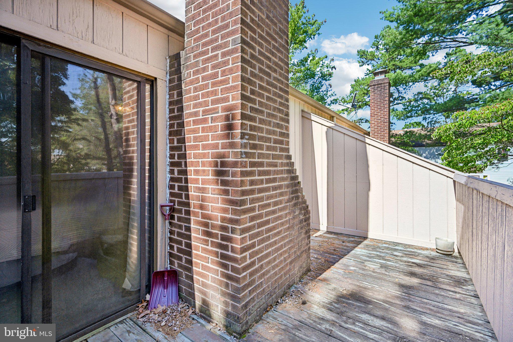 1502 Bromley Estate Pine Hill, NJ 08021 - Photo 34 of 36 a view of a balcony with wooden floor