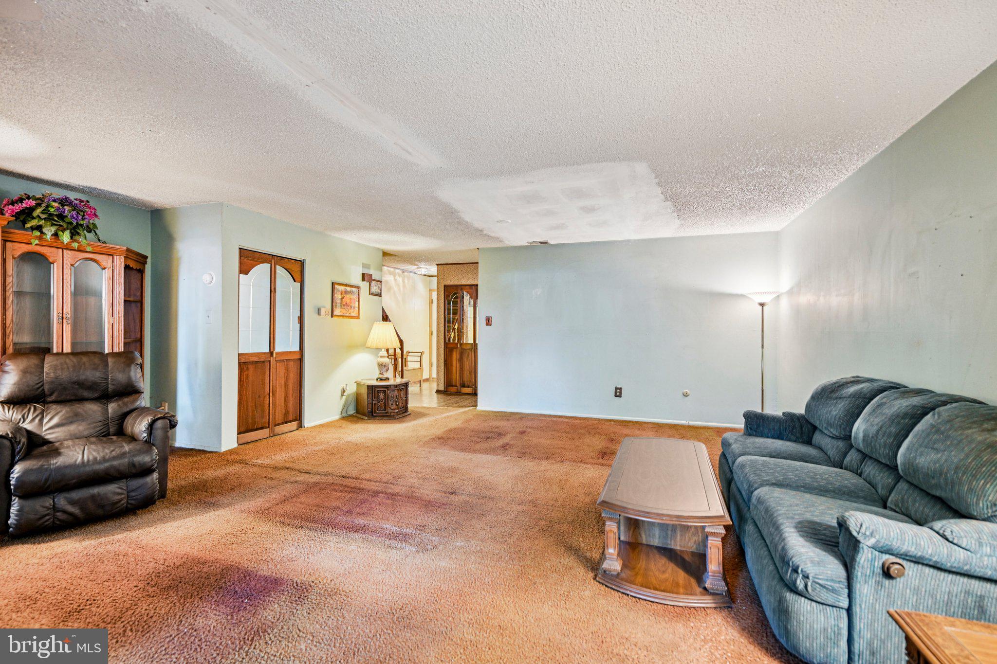1502 Bromley Estate Pine Hill, NJ 08021 - Photo 10 of 36 a living room with furniture window and a lamp