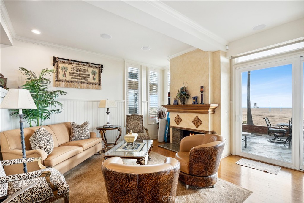 1008 West Oceanfront Newport Beach, CA 92661 - Photo 15 of 59 a living room with furniture and a large window