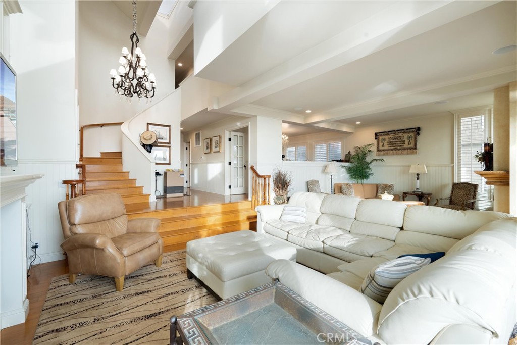1008 West Oceanfront Newport Beach, CA 92661 - Photo 18 of 59 a living room with furniture and a large window