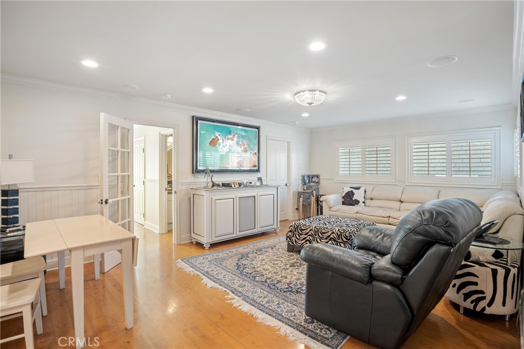 1008 West Oceanfront Newport Beach, CA 92661 - Photo 26 of 59 a living room with furniture and kitchen view