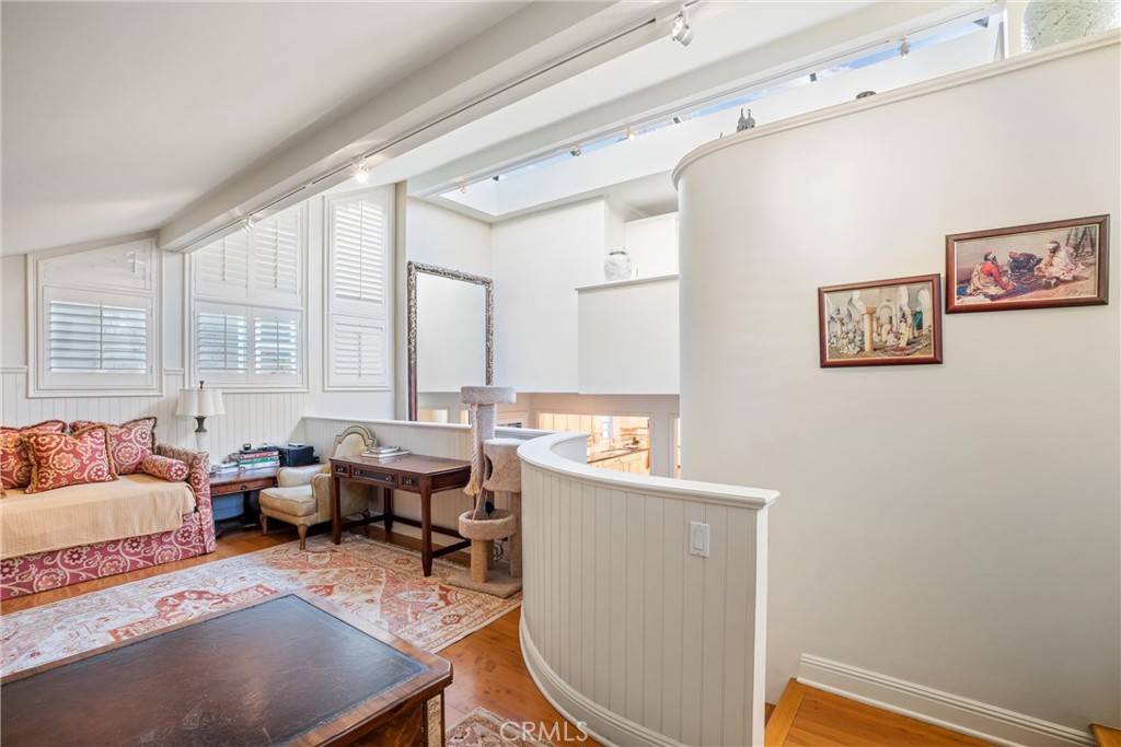 1008 West Oceanfront Newport Beach, CA 92661 - Photo 30 of 59 a living room with furniture and a window