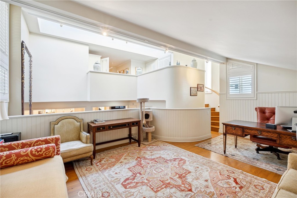 1008 West Oceanfront Newport Beach, CA 92661 - Photo 31 of 59 a living room with furniture and a window