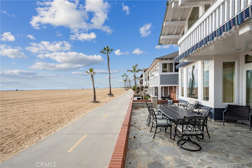 1008 West Oceanfront Newport Beach, CA 92661 - Photo 7 of 59 a view of a swimming pool with outdoor seating