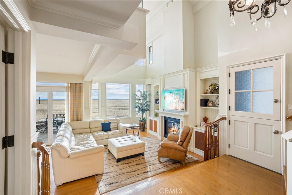 1008 West Oceanfront Newport Beach, CA 92661 - Photo 10 of 59 a living room with furniture and a table